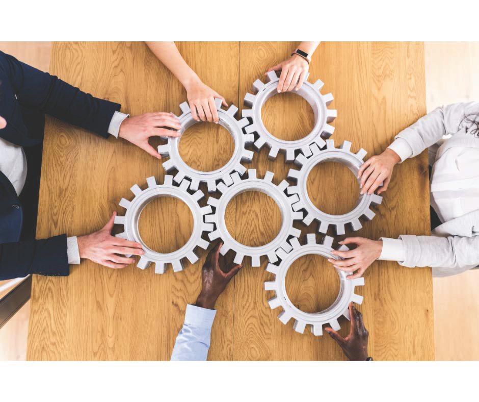 wheel spokes on a table with hands holding them